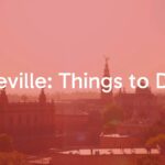 Seville skyline with Alcázar and cathedral, sunny day, vibrant colors, realistic.