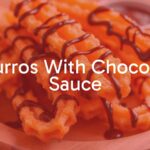 Freshly fried golden churros with crispy ridges, piled on a wooden plate, drizzled with rich dark chocolate sauce, warm and inviting, food photography style.