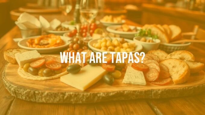 Assortment of Spanish tapas on a wooden table, vibrant colors, olives, cheese, chorizo, bread, cozy bar setting, social dining atmosphere, realistic.